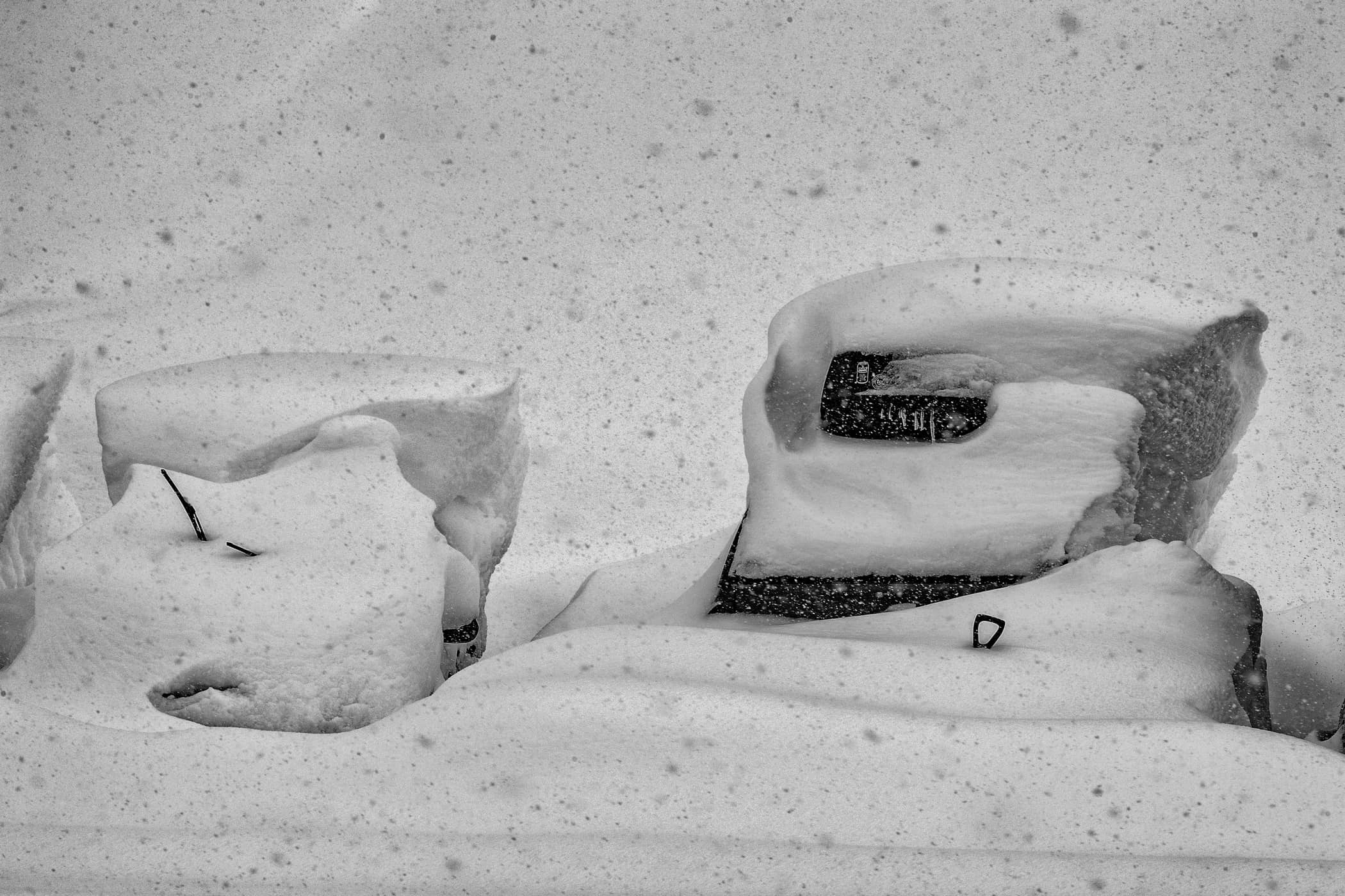 Alta_ParkingLot_SnowCoveredCars photo